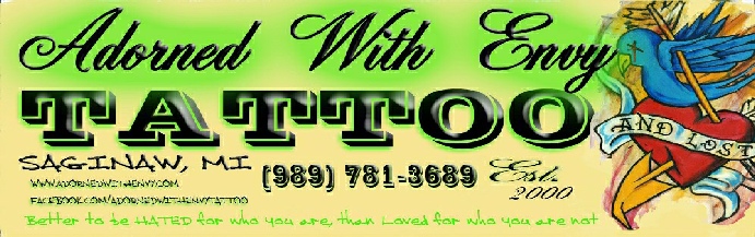 Adorned with Envy tattoo and piercing in Saginaw, MI