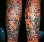 neo tradional mans ruin half sleeve tattoo